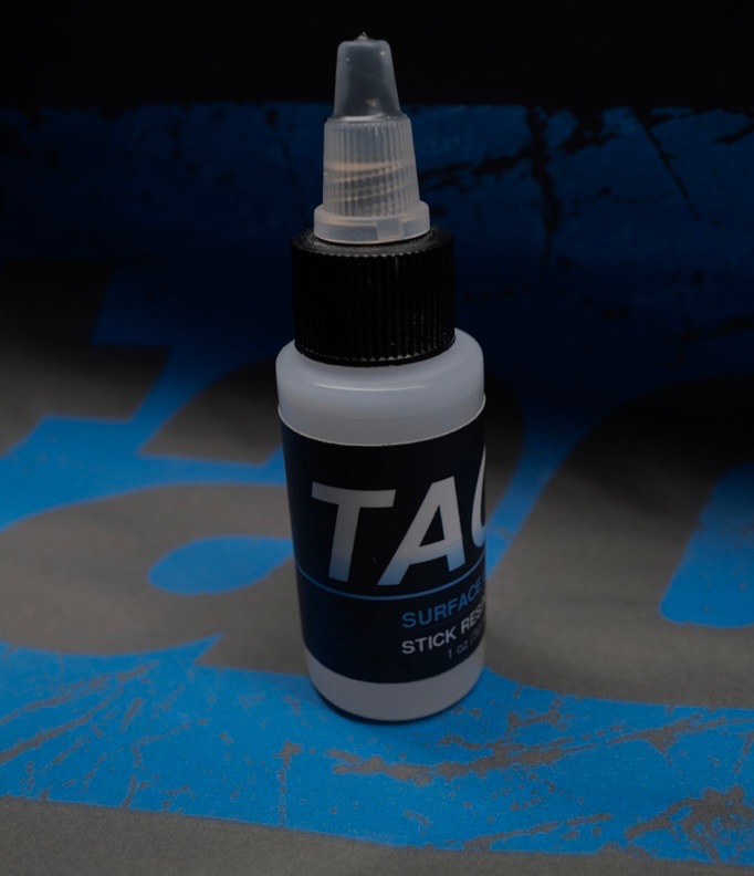 Standing bottle of TACC Surface Lock pre-session climbing skin prep